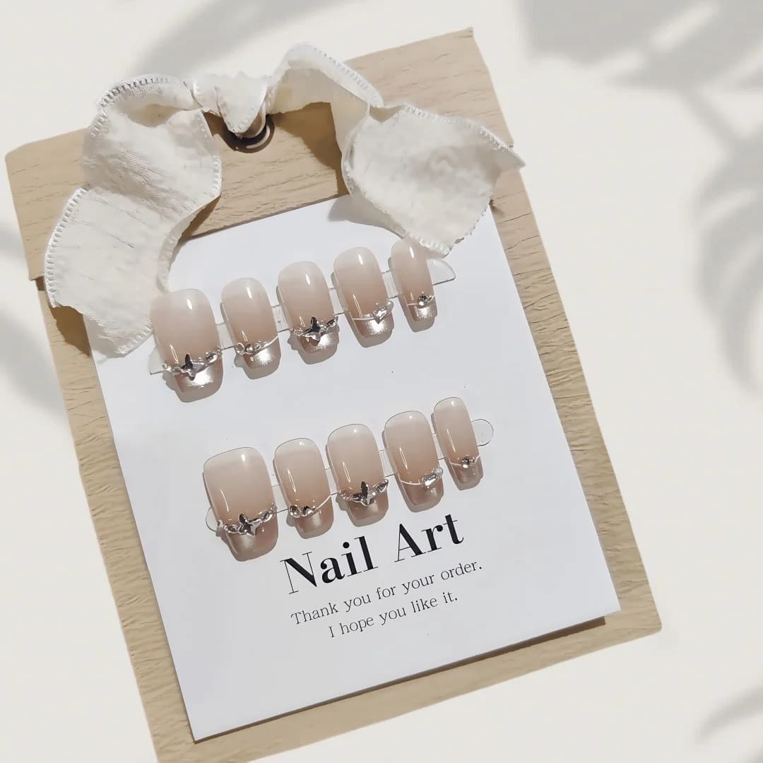 French Tip Press-On Nails with Butterfly Rhinestones and Cat Eye Effect
