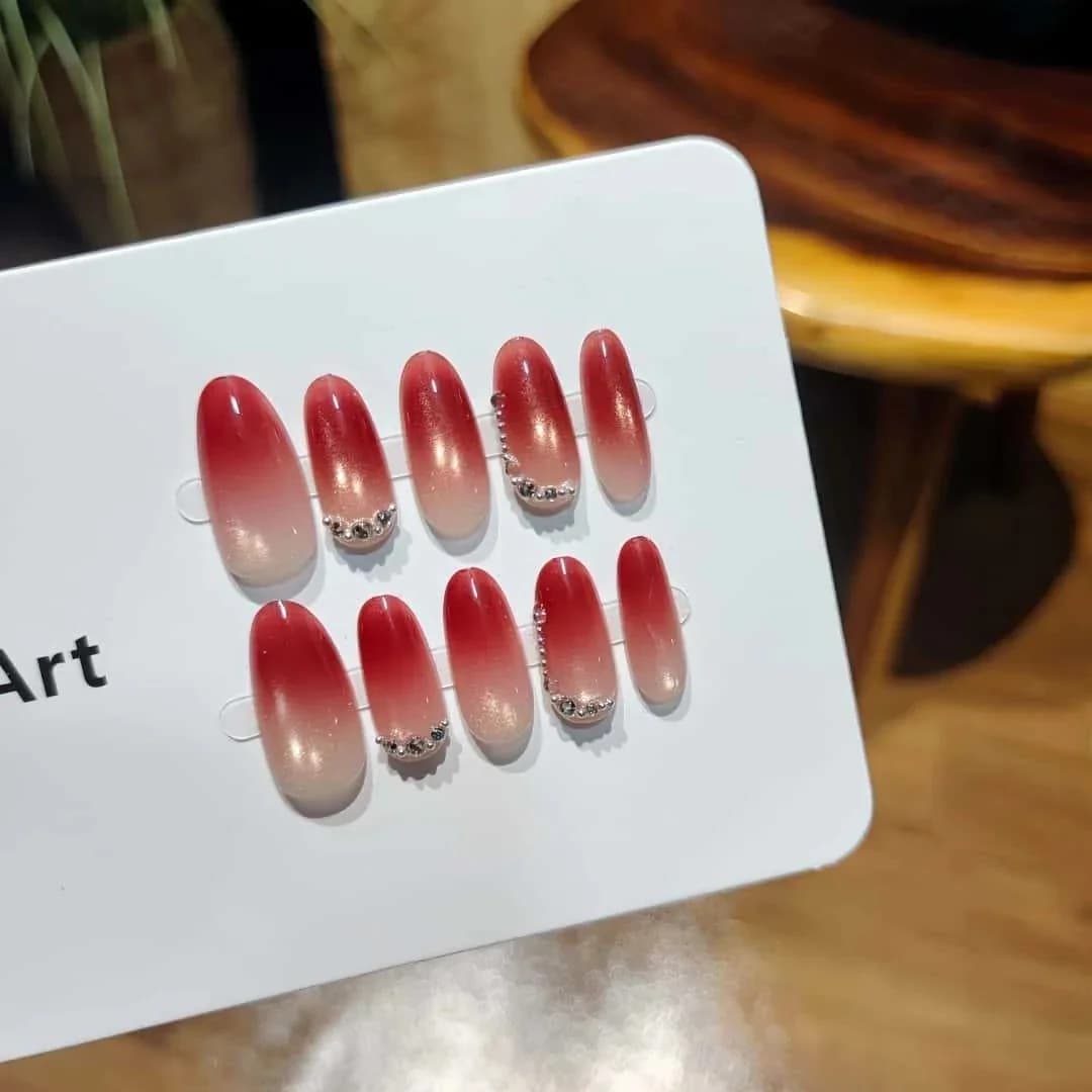 Red Cat Eye Press On Nails with Rhinestones, Medium Oval Shape