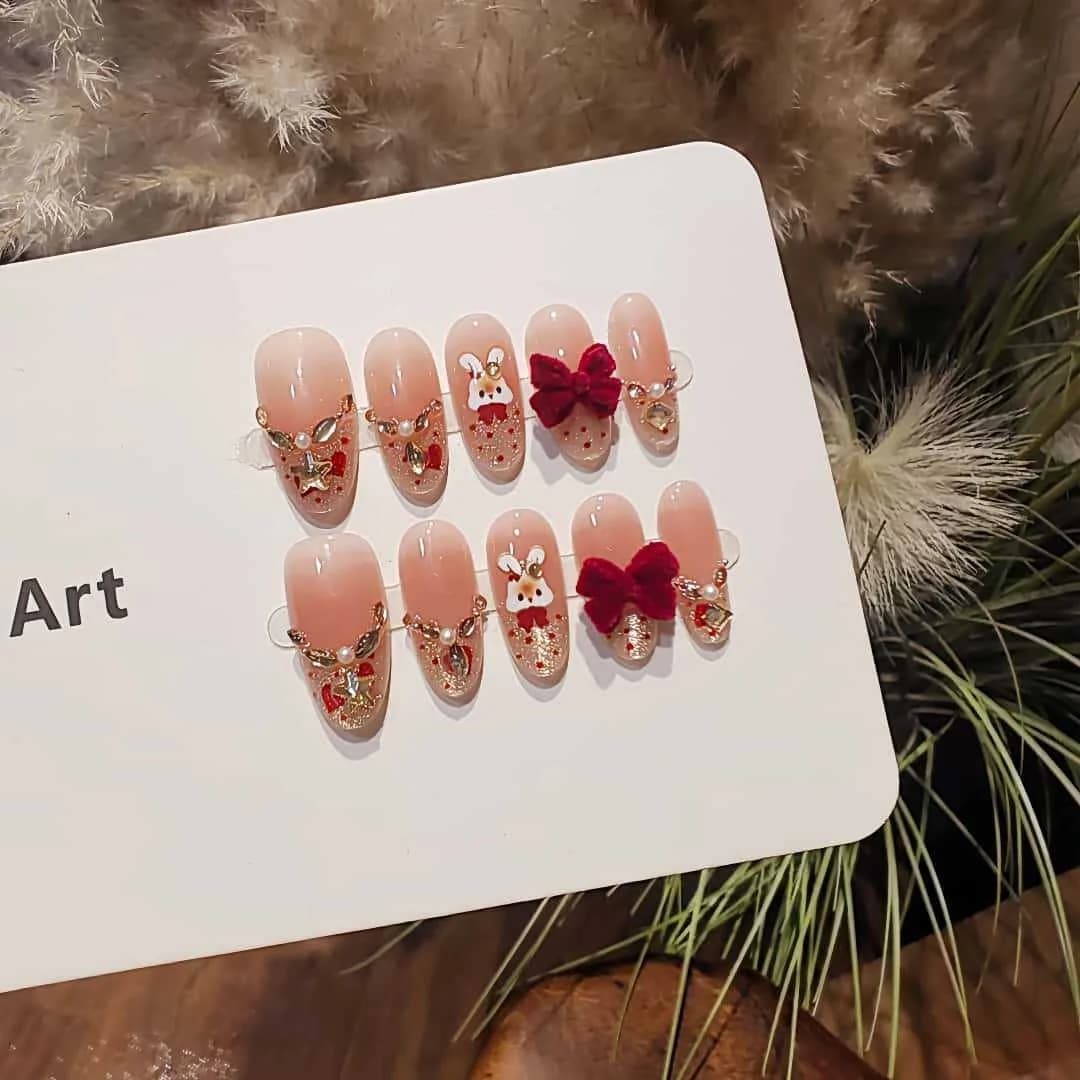 Press-On Nails Cat Eye French Tip with Rhinestones and Bow Design