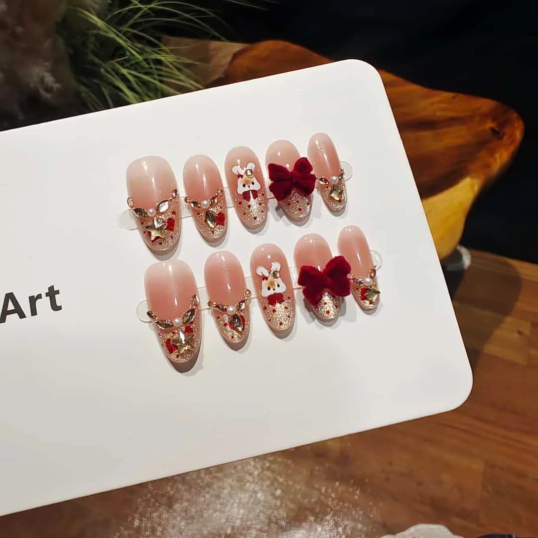 Press-On Nails Cat Eye French Tip with Rhinestones and Bow Design